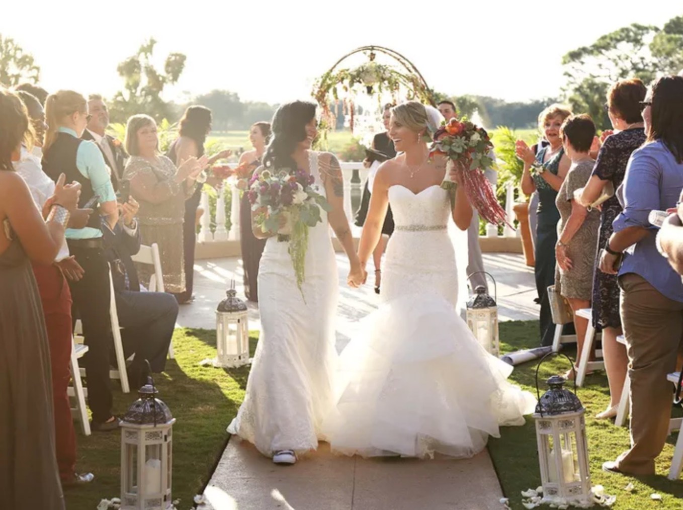A bridal couple walking down the aisle