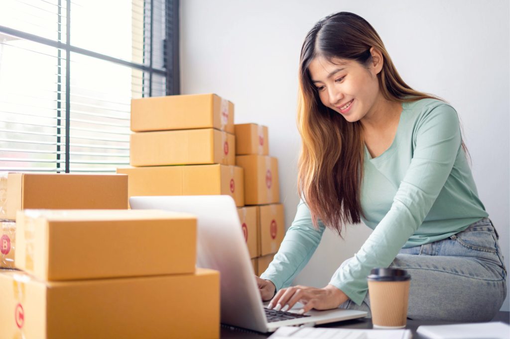 woman on laptop fighting inflation costs