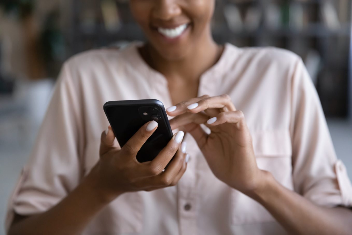 Woman using WeddingPro App on phone