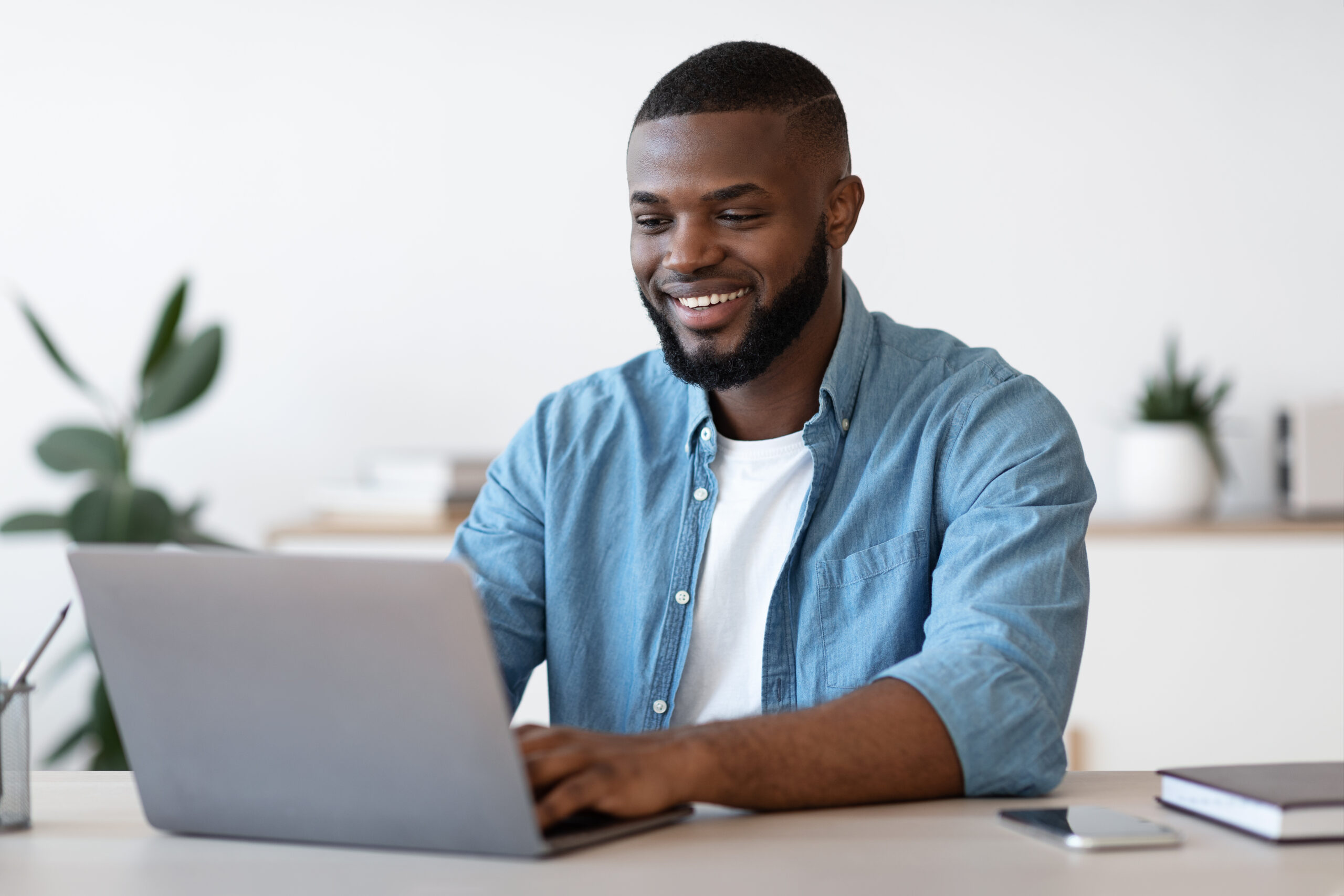 Young Man Happy About Website Accessibility