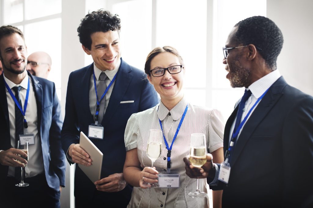 group talking at a networking event