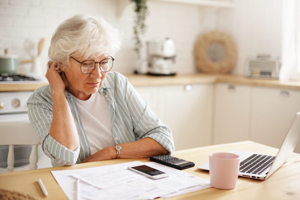 frustrated woman on phone to break up with client