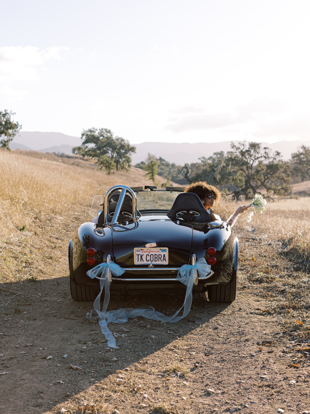 Just married couple in convertible