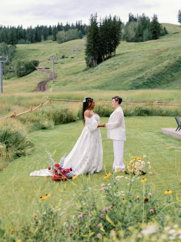 Female couple in green field